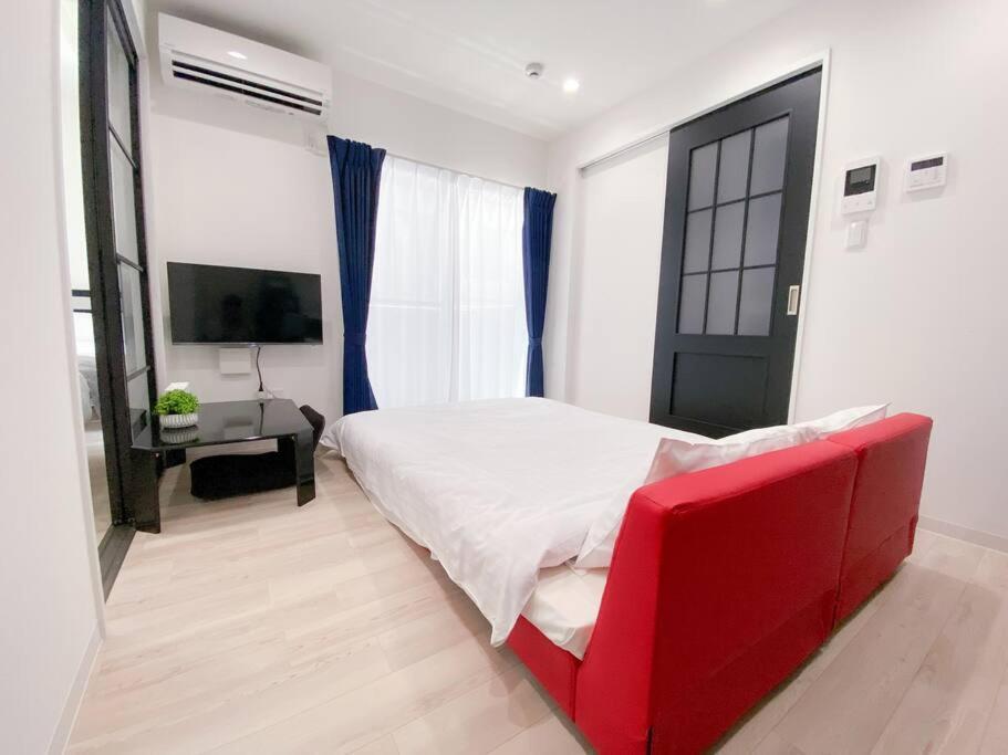 Residential Hotel Glitter Usjまで1駅5分 Osaka Værelse billede