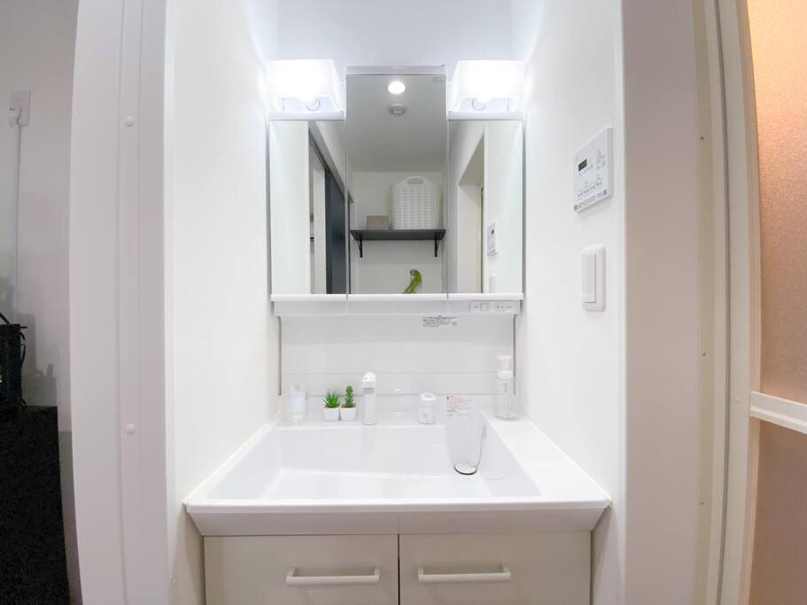 Residential Hotel Glitter Usjまで1駅5分 Osaka Værelse billede
