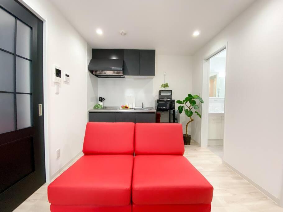 Residential Hotel Glitter Usjまで1駅5分 Osaka Værelse billede