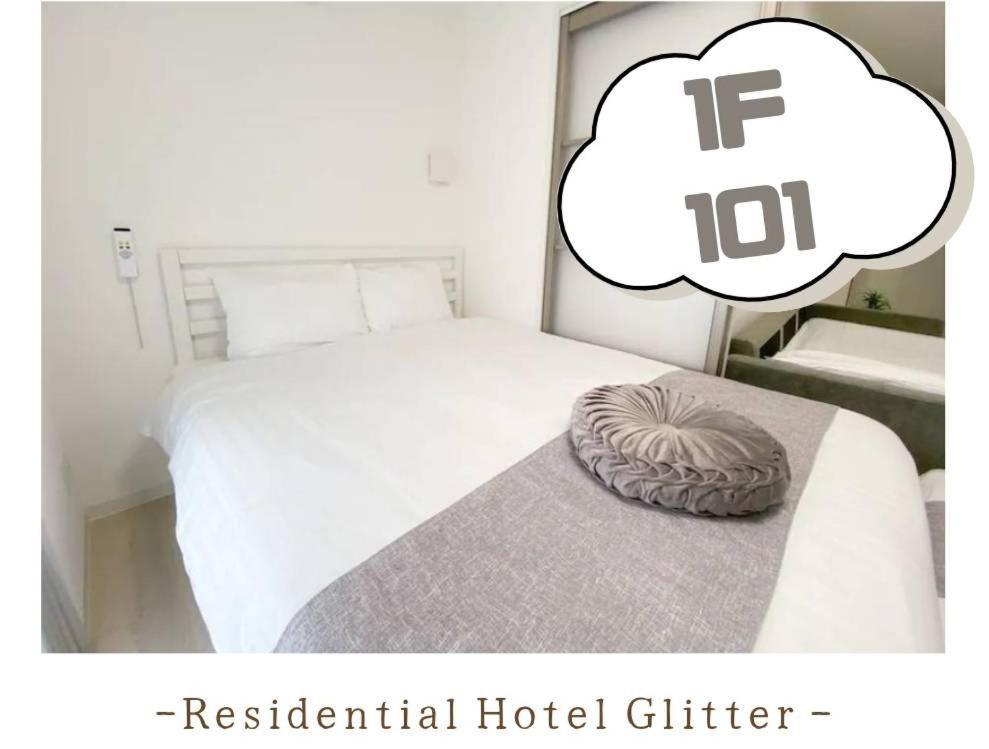 Residential Hotel Glitter Usjまで1駅5分 Osaka Værelse billede
