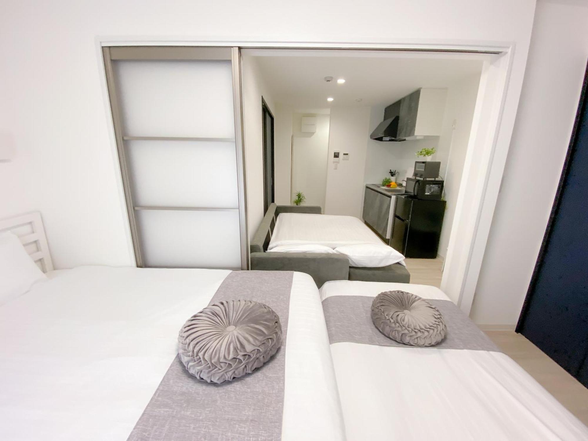 Residential Hotel Glitter Usjまで1駅5分 Osaka Eksteriør billede