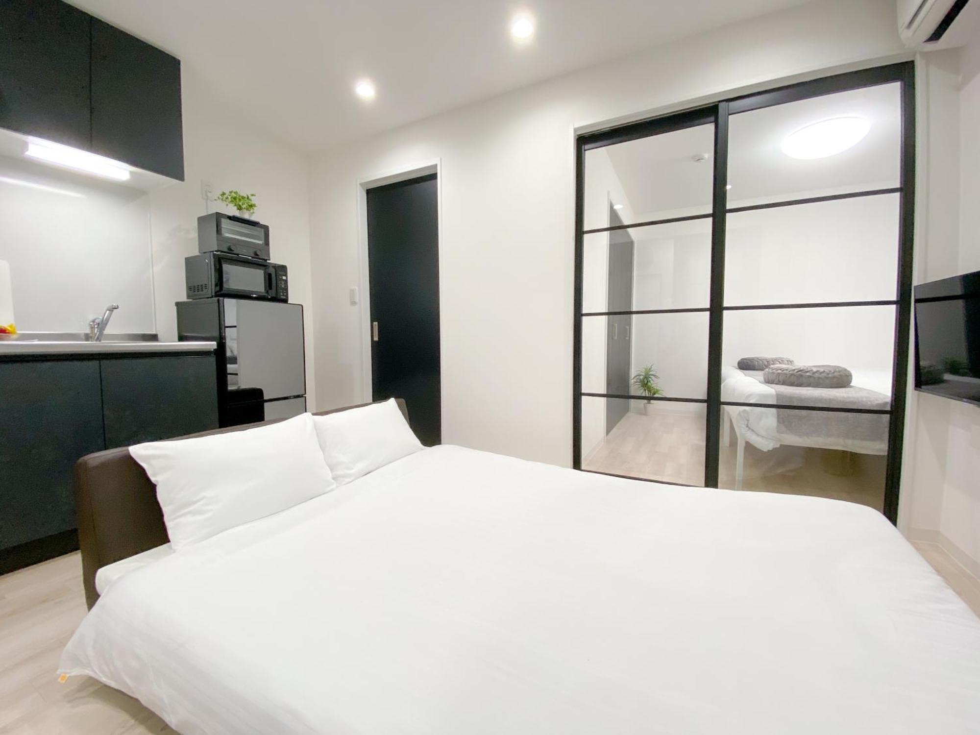 Residential Hotel Glitter Usjまで1駅5分 Osaka Eksteriør billede